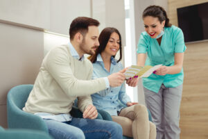 Patient talking to in-network dentists about insurance coverage